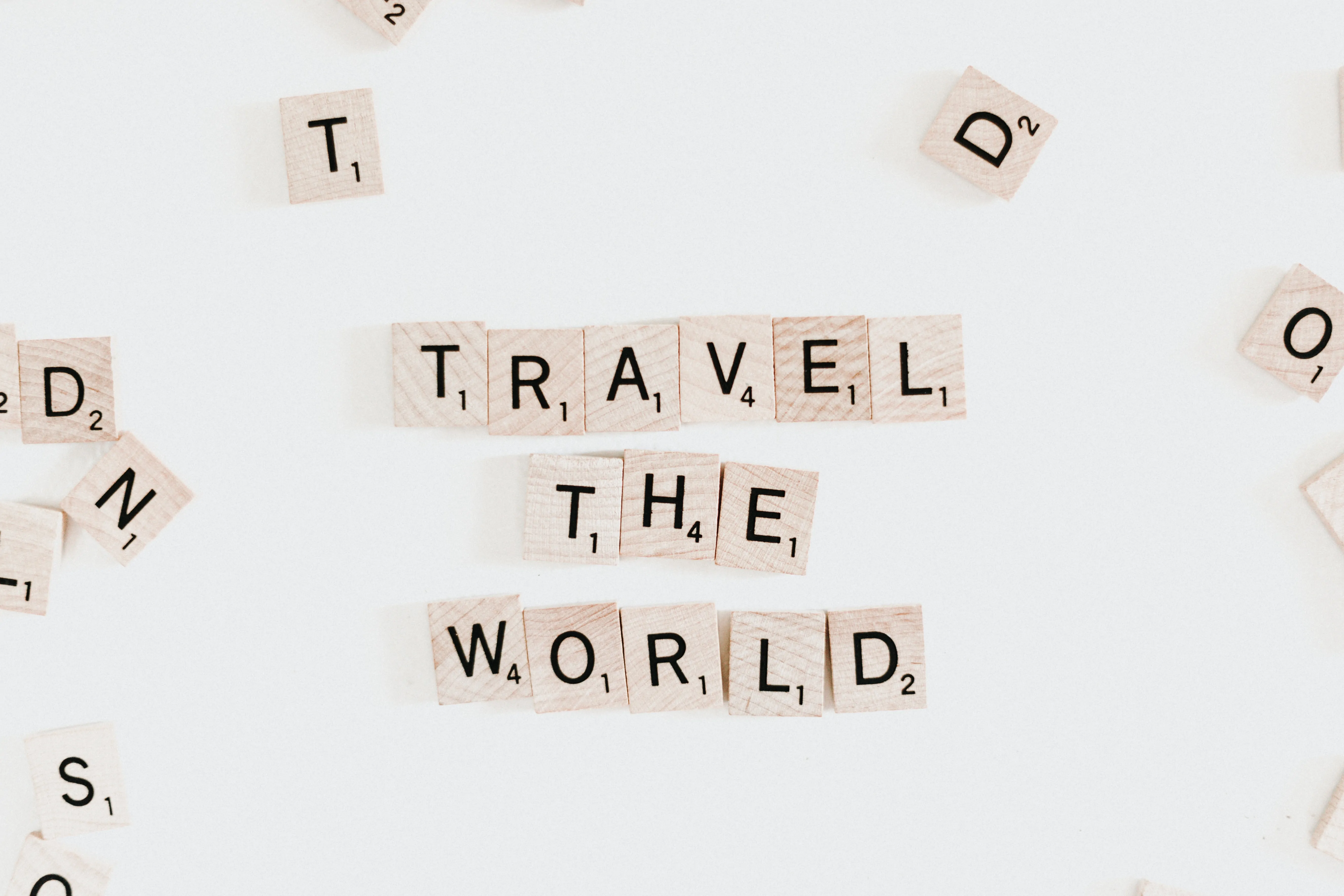 TripAdvisor letter tiles spelling Travel The World
