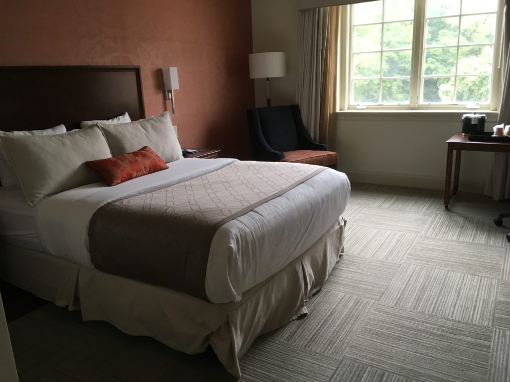 bed in standard bedroom at Rizzo Center