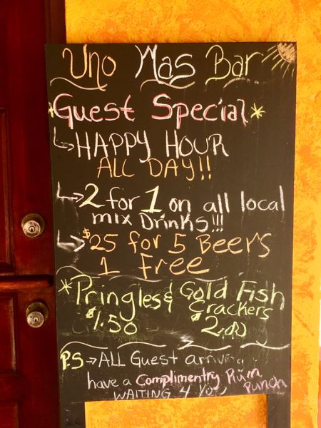 happy hour sign at Seaside Cabanas in Caye Caulker