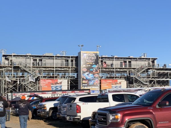 metal building with parking lot in foreground - Grandstand at the Dirt Track in Concord, NC