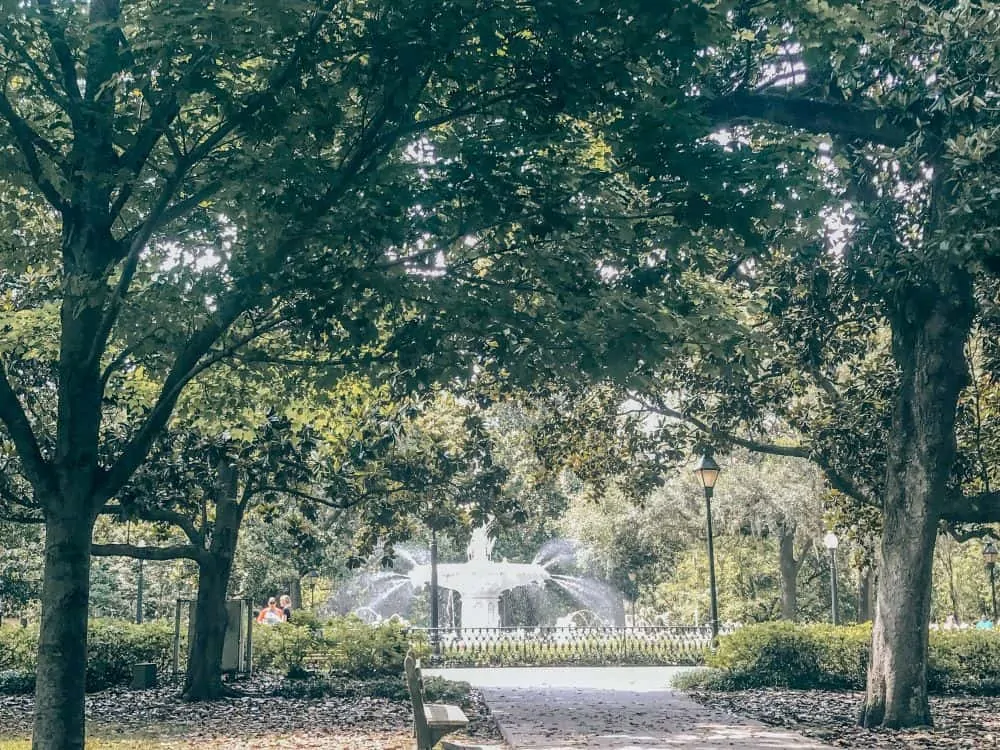 TOP 20 BEST WEEKEND GETAWAYS IN THE US featured by top US travel blog, The Common Traveler: image of  park with water fountain in Savannah, Georgia