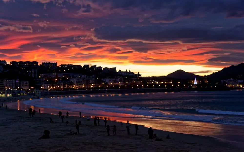 sunset over beach of San Sebastian in Spain