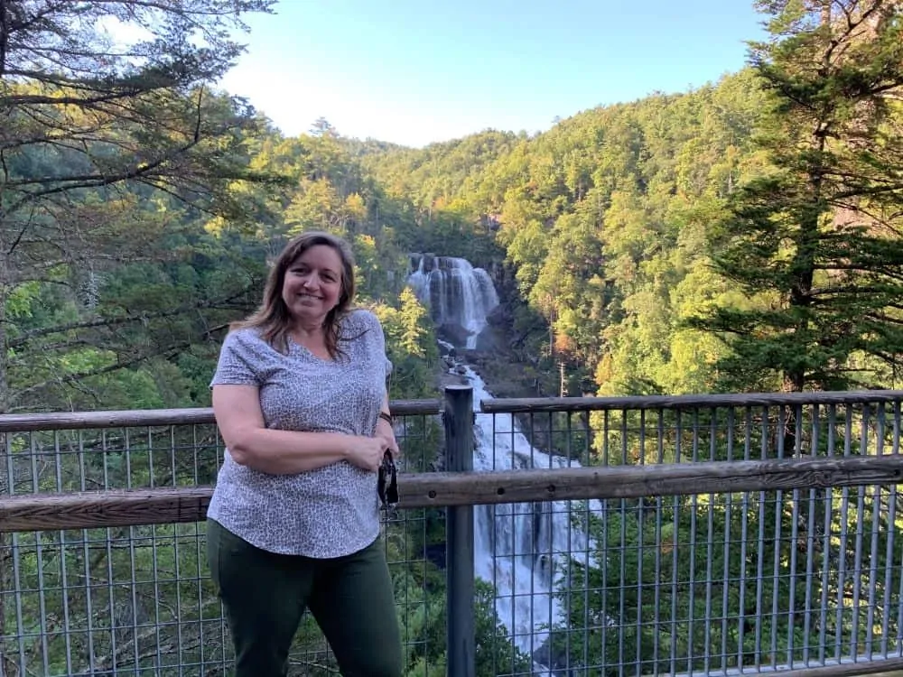 woman in front of Whitewater Falls, Cashiers, NC