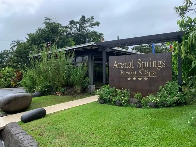Arenal Springs Resort review featured by top international travel blogger, The Common Traveler | image: Arenal Springs Resort & Spa hotel sign