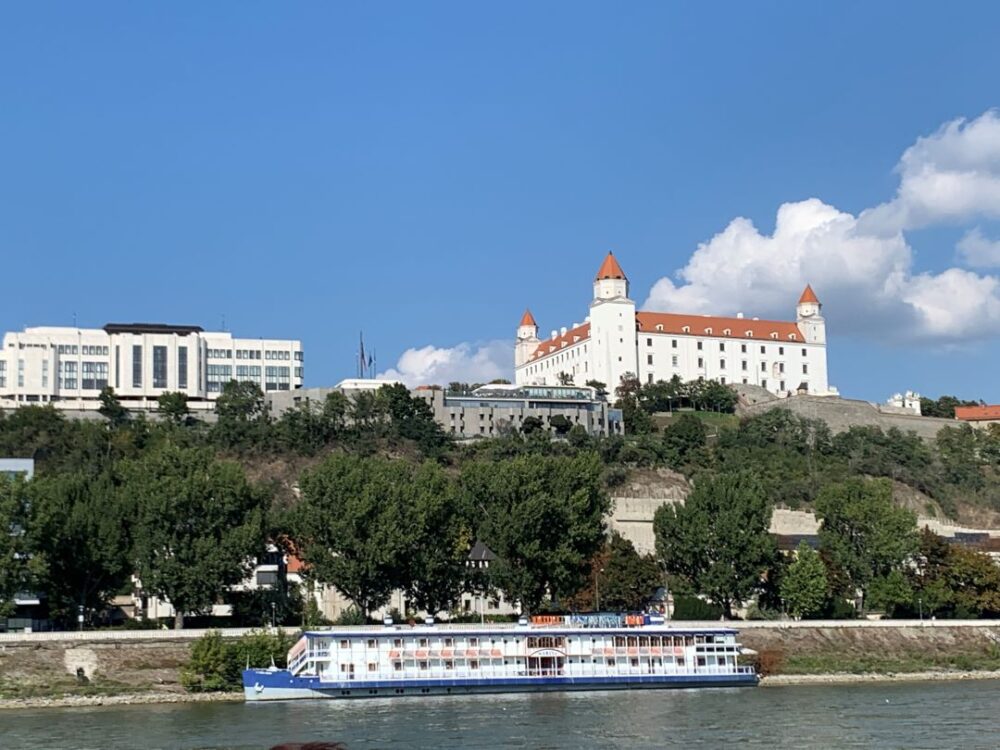 2 WEEK CENTRAL EUROPE ITINERARY featured by top travel blogger, The Common Traveler | image: Bratislava Castle from river view