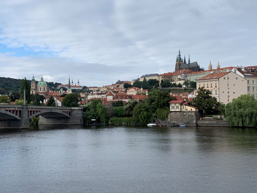 2 WEEK CENTRAL EUROPE ITINERARY featured by top travel blogger, The Common Traveler | image: view of Prague from river
