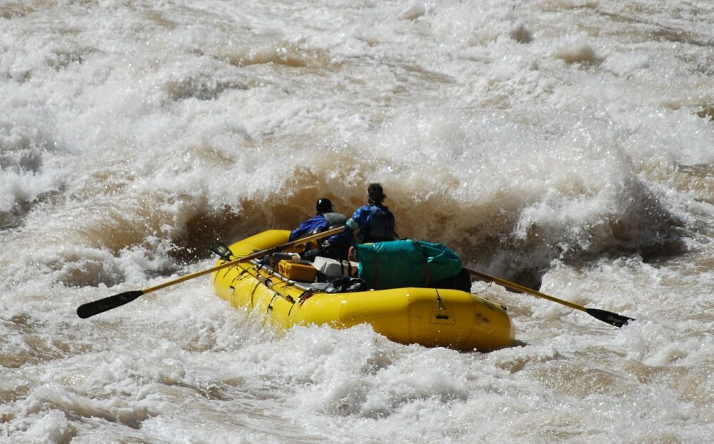 Top 5 Best Places to Go White Water Rafting featured by top travel blogger, The Common Traveler.