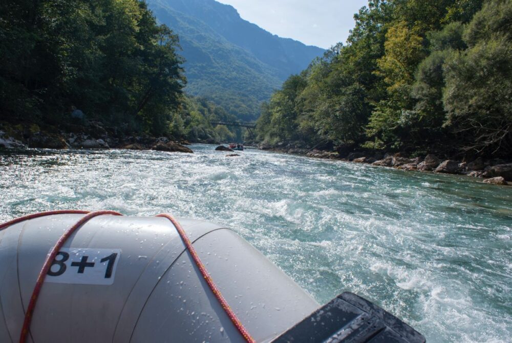 Top 5 Best Places to Go White Water Rafting featured by top travel blogger, The Common Traveler.