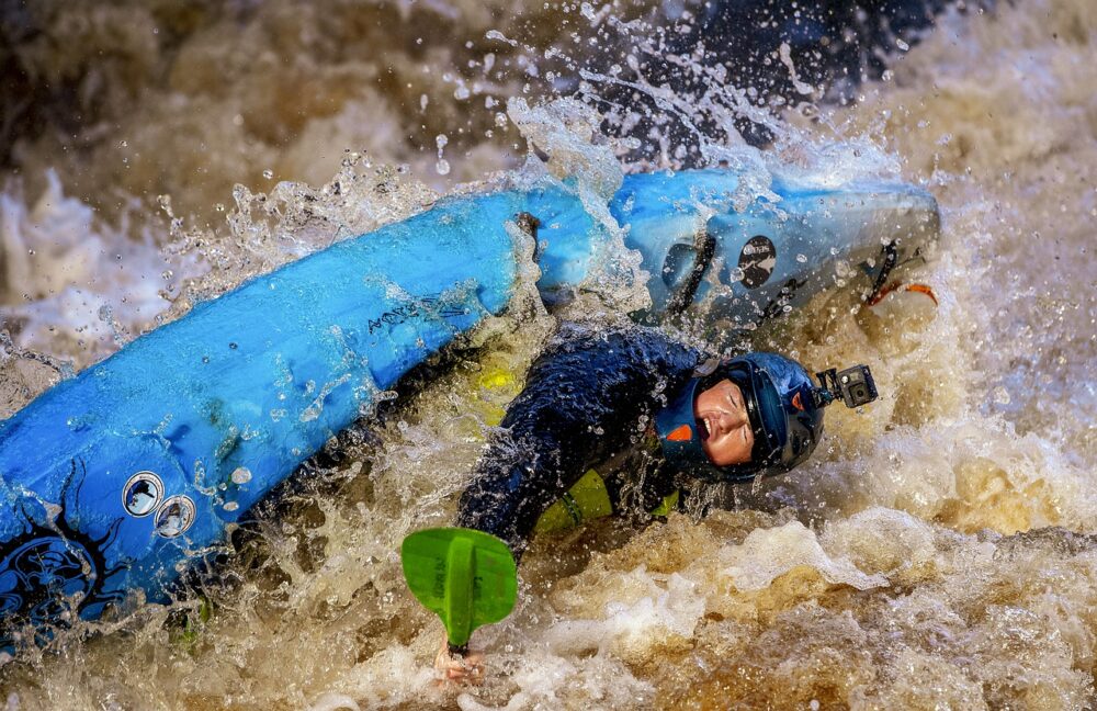 Top 5 Best Places to Go White Water Rafting featured by top travel blogger, The Common Traveler.