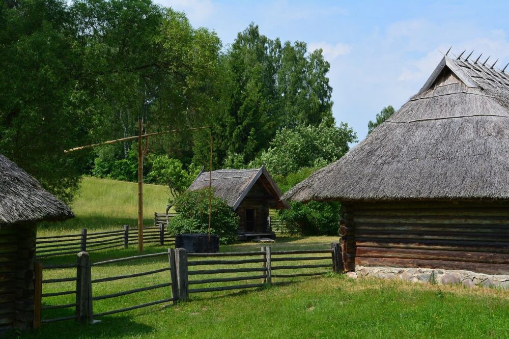 wooden houses at Rumsiskes Open Air Museum in Lithuania