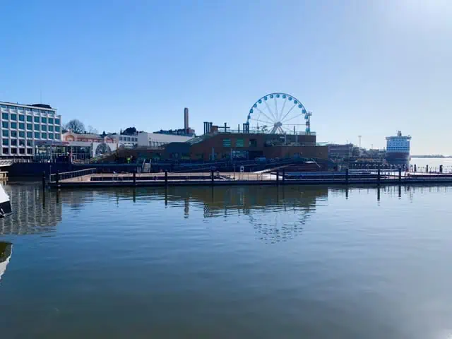 Best Day Trips From Tallin by The Common Traveler | image: Helsinki old port with Sky Wheel in background