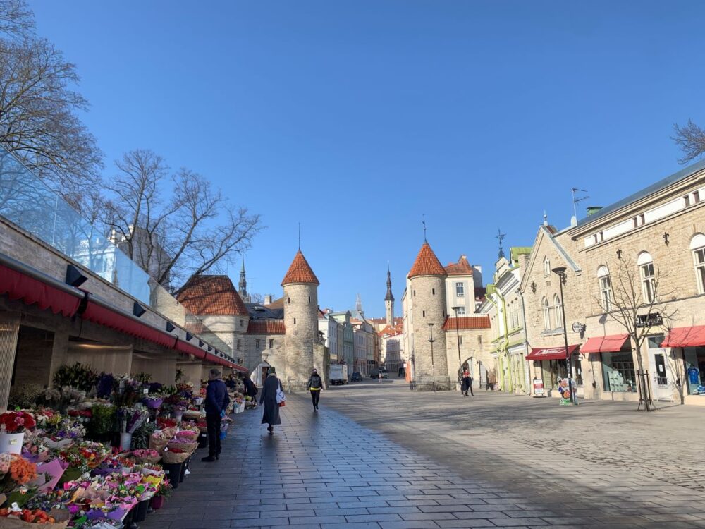 Best Things to do in Tallinn | The Common Traveler | image: Viru Gate with flower market in front