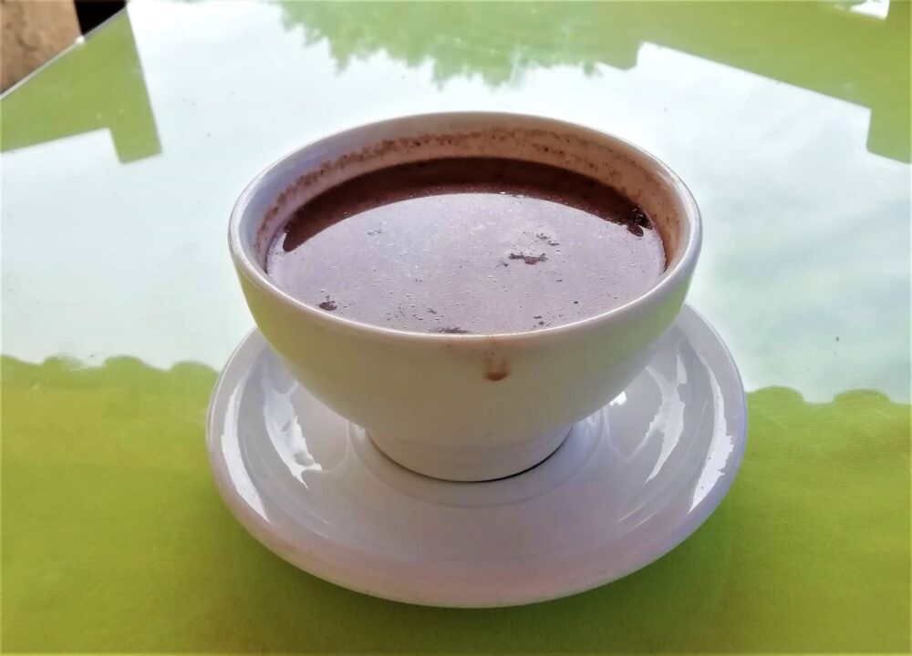The Ultimate Guide to Hiking Los Pueblos Mancomunados | The Common Traveler | image: cup of hot chocolate
