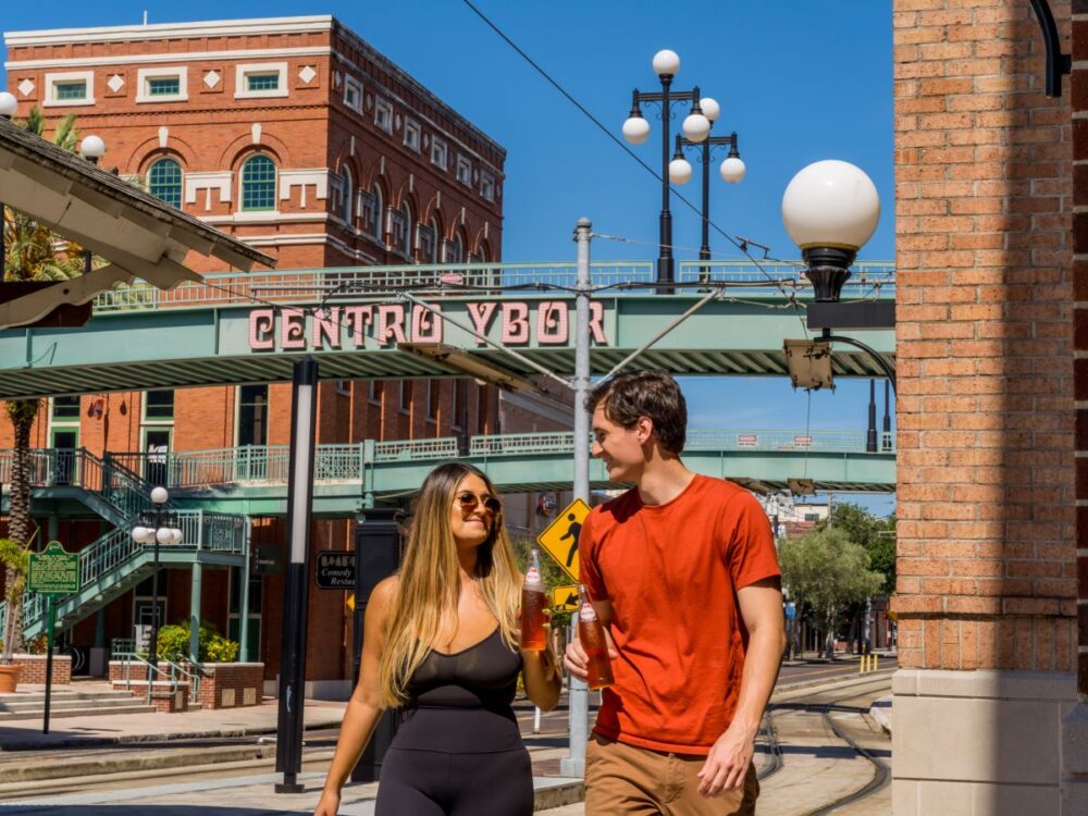 Best Things to Do in Tampa | The Common Traveler | image: couple walking in Centro Ybor