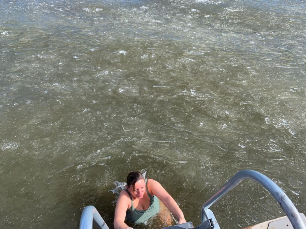 Best Things to Do in Helsinki | The Common Traveler | image: woman climbing metal stair out of icy water