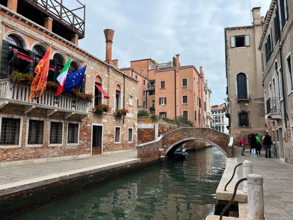 Tips for Visiting Venice Italy | The Common Traveler | image: bridge over canal in side areas