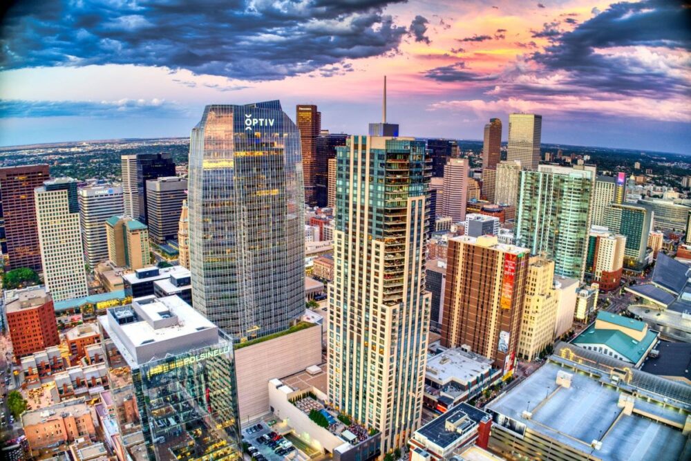 Colorado One Week Itinerary for Summer | The Common Traveler | image: skyline of Denver at sunset
