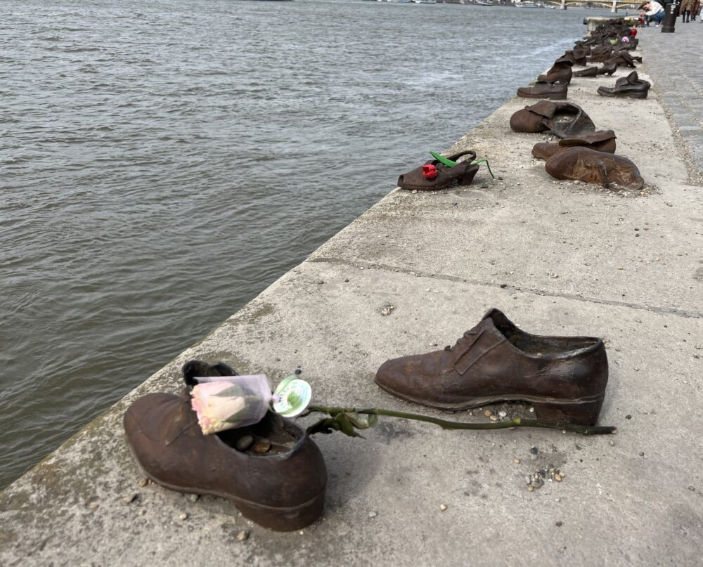 15 Best Souvenirs From Hungary | The Common Traveler | image: shoes displayed along Danube