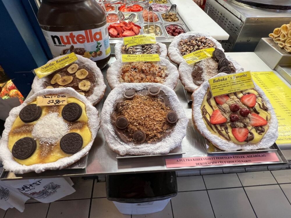 Hungarian Foods and Drinks to Try | The Common Traveler | image: various sweet pancakes at Central Market in Budapest