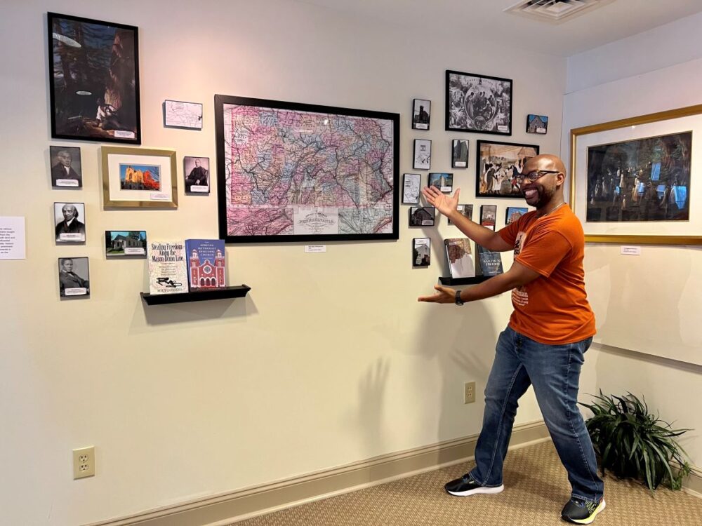 Howard County MD Weekend Adventure | The Common Traveler | image: man showing displays at Howard County Center of African American Culture