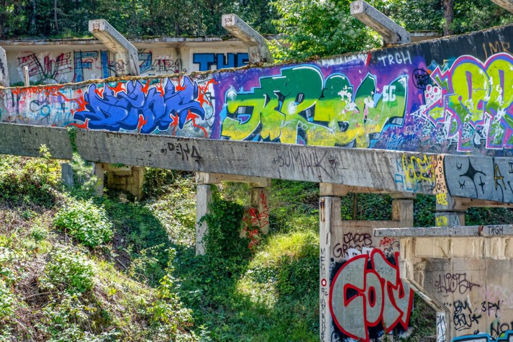 Top Things to Do in Sarajevo | The Common Traveler | image: abandoned bobsled track with graffiti