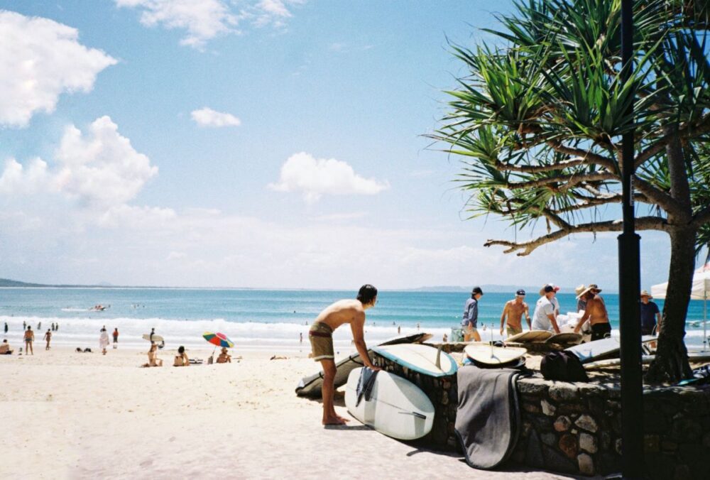 5 Amazing Beaches to Visit in Australia | The Common Traveler | image: people at Noosa Main Beach