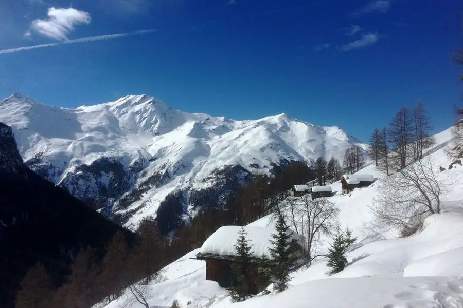 15 Famous Places in Europe | The Common Traveler | image: snowy alps with cabins