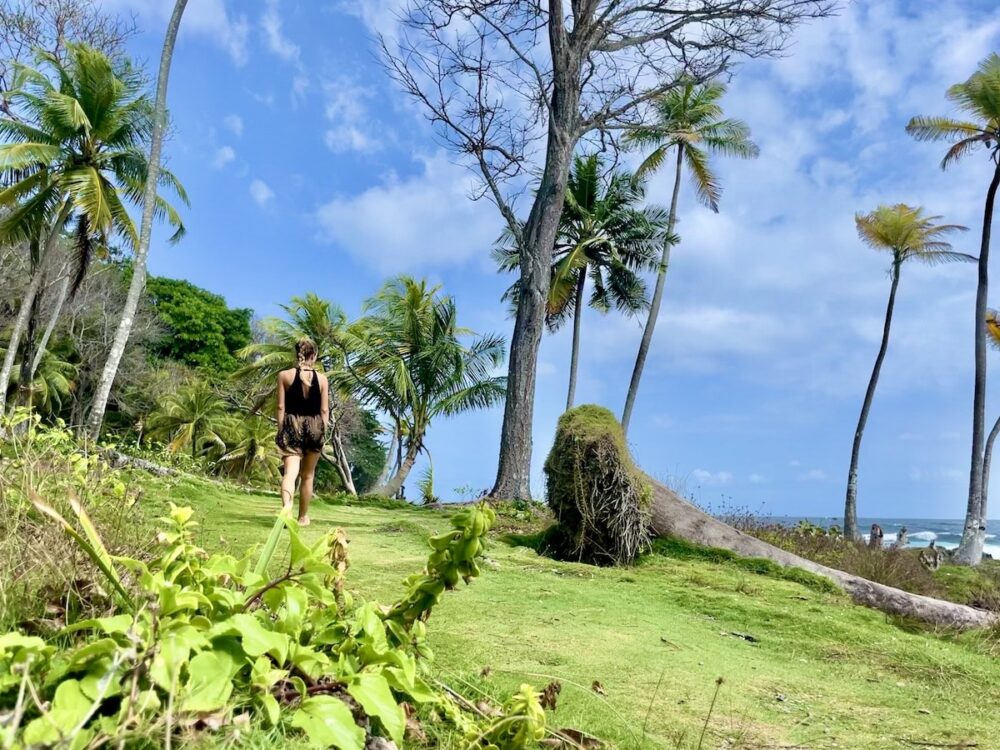 Wanderlust Wardrobe: Packing for Practicality and Style | The Common Traveler | image: travel wardrobe for woman walking in jungle 