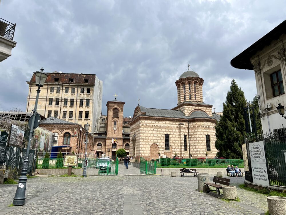 Things to Do in Bucharest | The Common Traveler | image: Old Town church and cobblestone streets