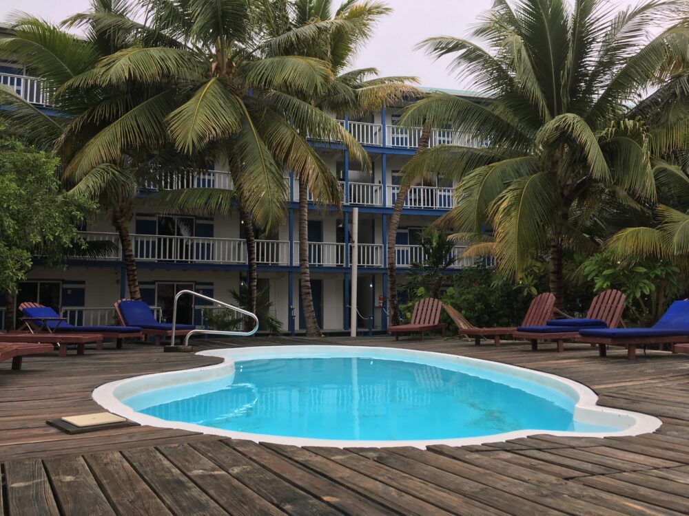 Caye Caulker or Ambergris Caye? | The Common Traveler | image: pool at  Caribbean Villas Hotel in San Pedro