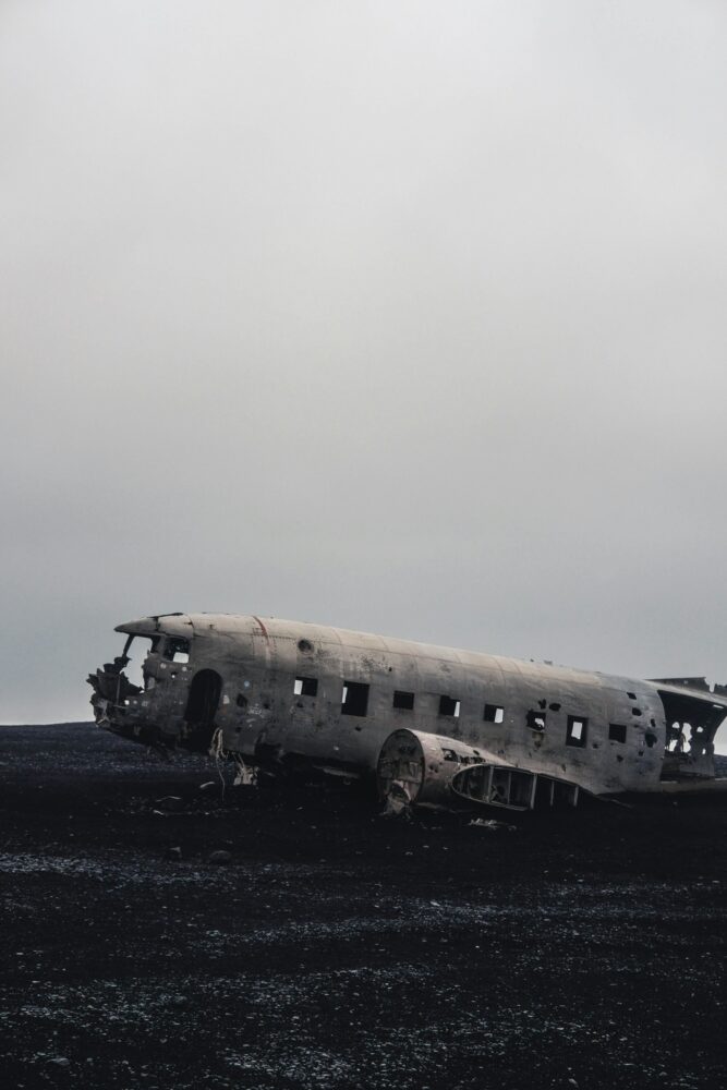 Best Things to Do in Vik, Iceland | The Common Traveler | image: abandoned airplane in black and white