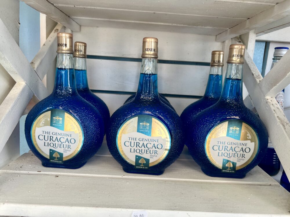 Unique Souvenirs From Curaçao | The Common Traveler | image: bottles of blue Curaçao