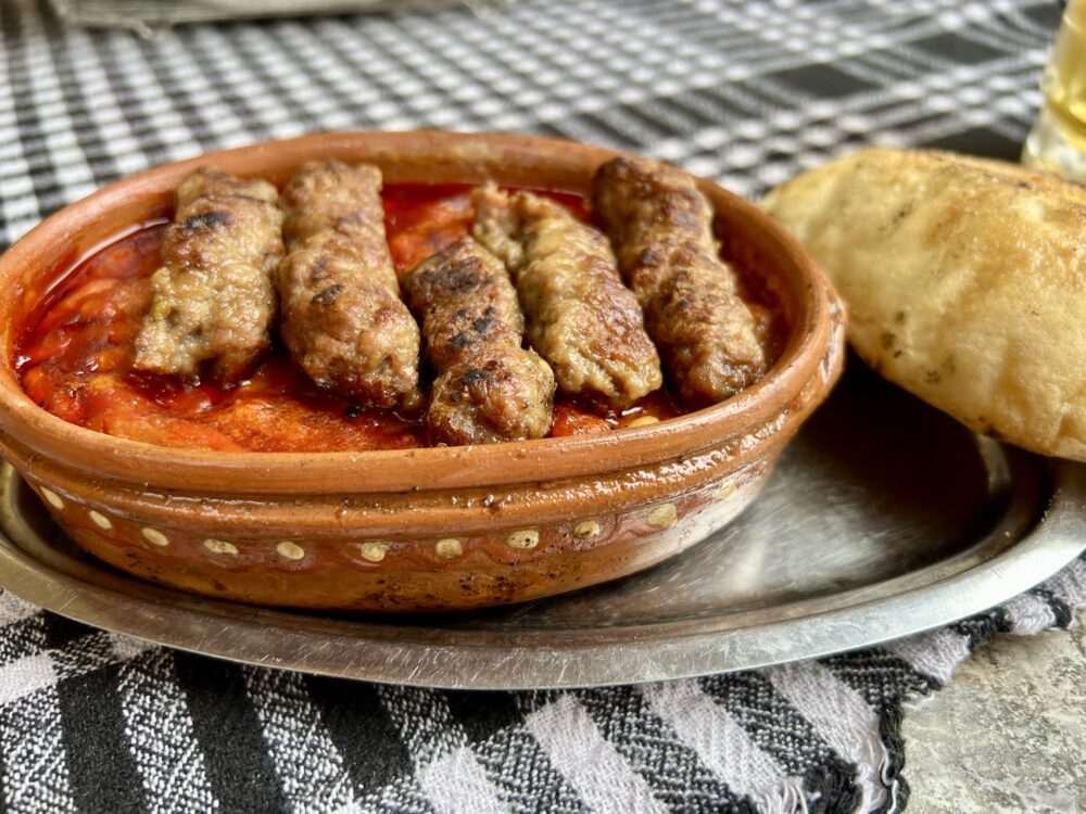 Macedonian Foods to Try | The Common Traveler | image: meat and beans in clay pot
