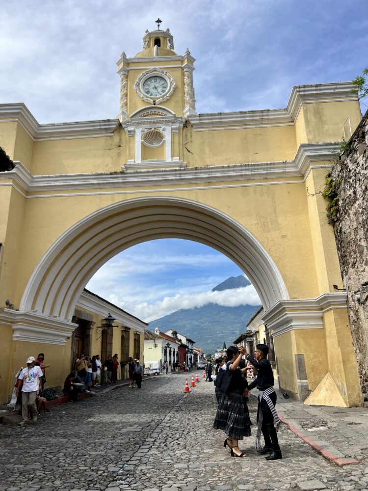 Unforgettable Things to Do in Antigua, Guatemala | The Common Traveler | image: yellow Santa Catalina Arch