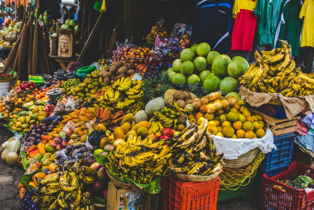 Unforgettable Things to Do in Antigua, Guatemala | The Common Traveler | image: fruits in baskets at market