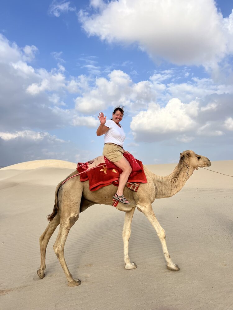 Packing List for Women Traveling to the Middle East | The Common Traveler | image: Woman on camel