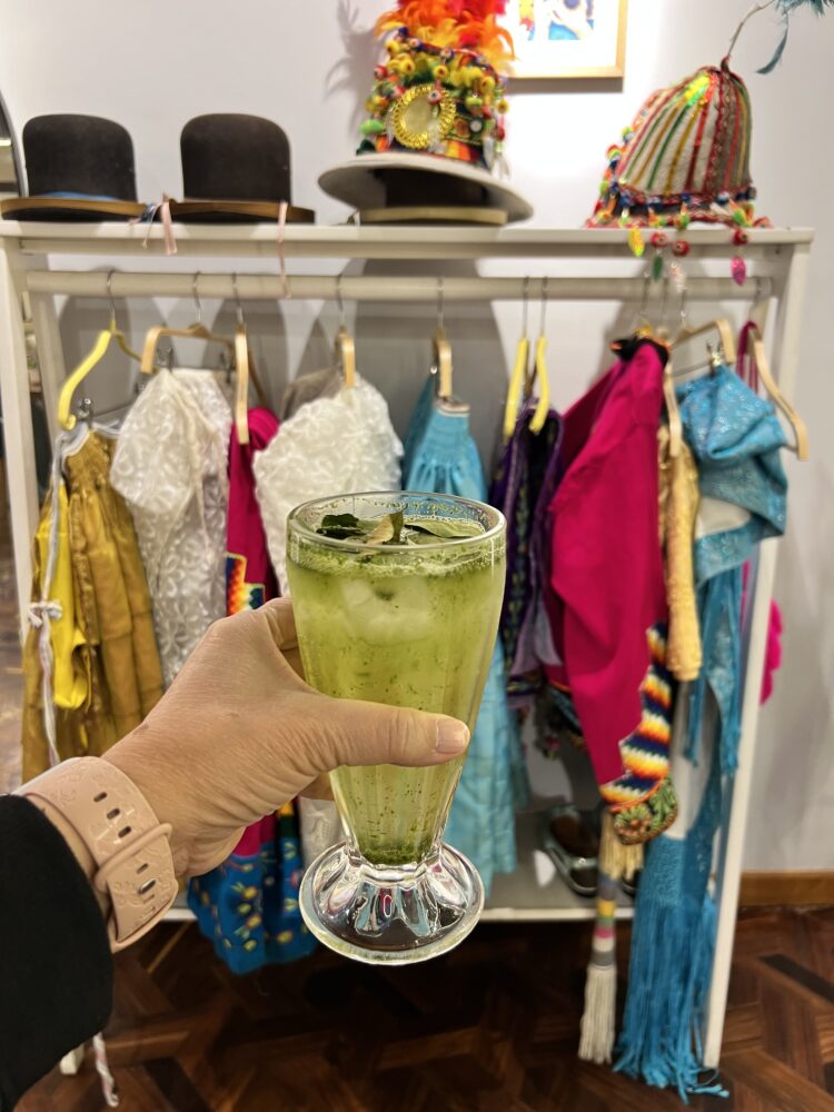 Traditional Bolivian Foods to Try | The Common Traveler | image: hand holding Bolivian iced tea