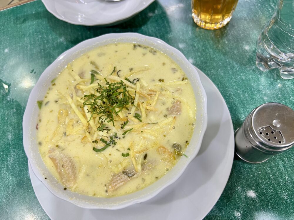Traditional Bolivian Foods to Try | The Common Traveler | image: sopa de mani (yellow soup)