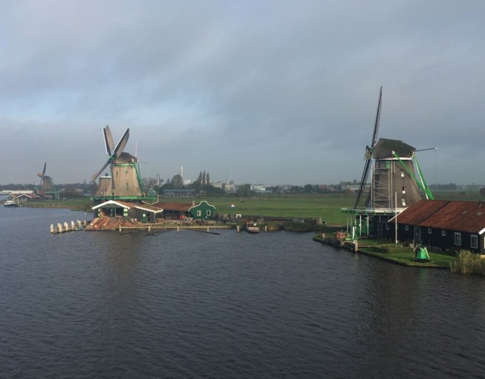 7 Best Day Trips From Amsterdam | The Common Traveler | image: windmills of Zaanse Schans