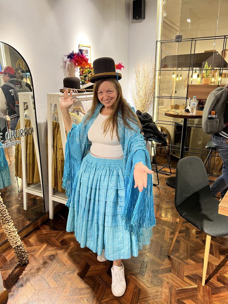 Bolivia Souvenirs | The Common Traveler | image: woman dressed in traditional cholita costume
