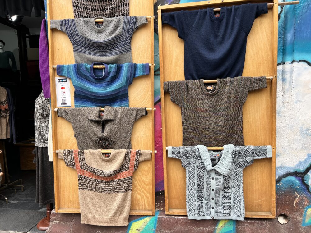 Bolivia Souvenirs | The Common Traveler | image: display of alpaca wool sweaters