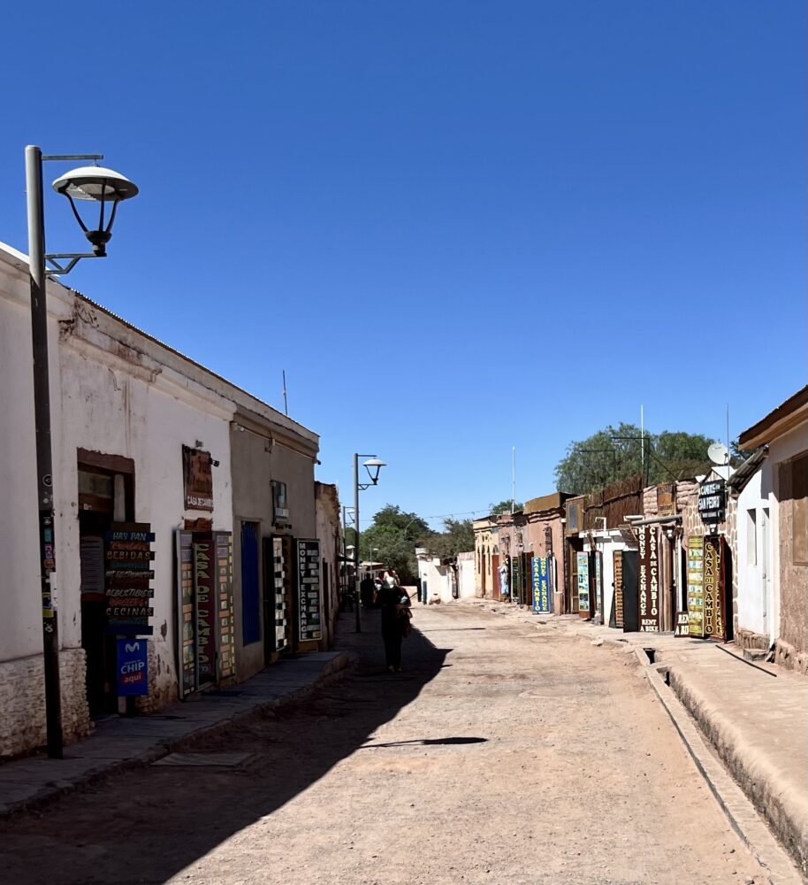San Pedro de Atacama | The Common Traveler | image: dirt street with exchange buildings