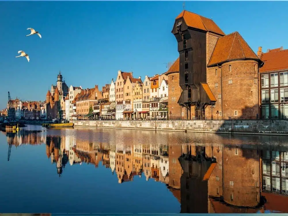 Winter in Gdansk | The Common Traveler | image: granary and old buildings along river