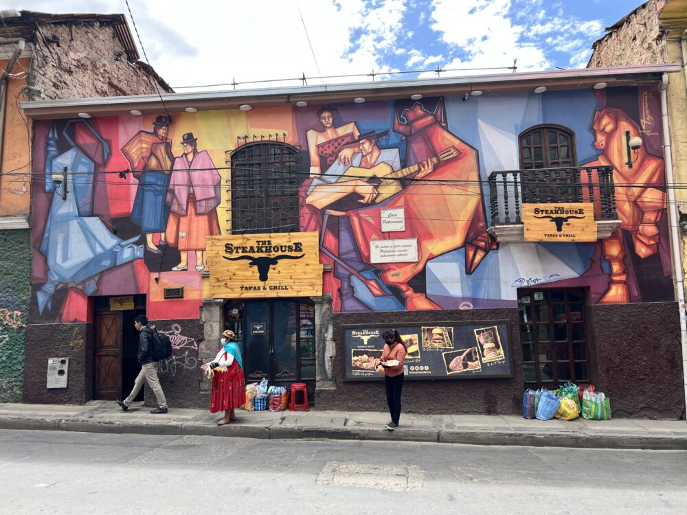 Guide to La Paz, Bolivia | The Common Traveler | image: mural of local culture at The Steakhouse