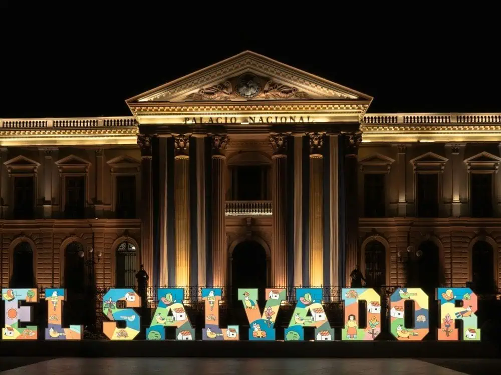 What to Do in San Salvador | The Common Traveler | image: Palacio Nacional lit up at night