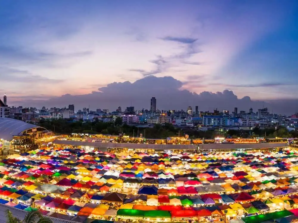 What to Do in Bangkok in a Day | The Common Traveler | image: colorful tents in market as evening falls