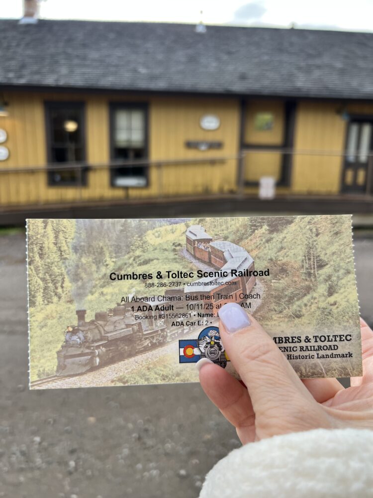 Best Scenic Steam Train Rides in America | The Common Traveler | image: hand holding Cumbres & Toltec train ticket