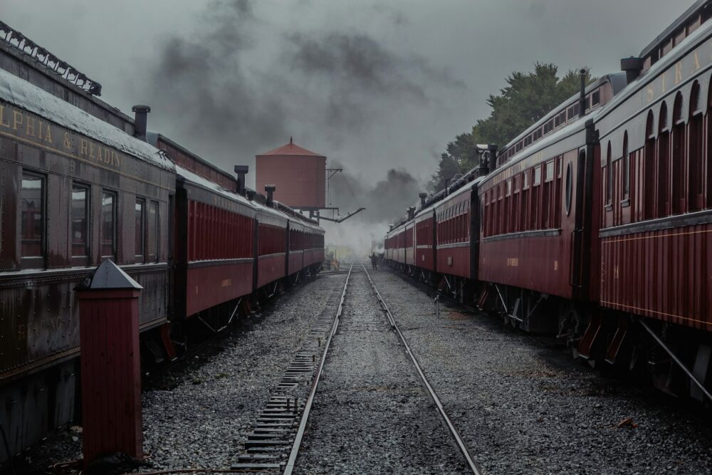 Best Scenic Steam Train Rides in America | The Common Traveler | image: dark red steam engines in Strasburg Rail Road
