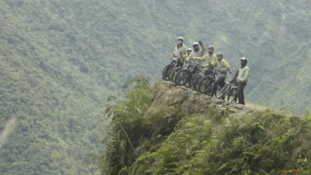 Gringo Trail in Bolivia: 5 Places to Escape the Usual Tourist Route | The Common Traveler | image: group of people on bicycles on Death Road