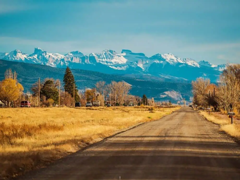 Durango, Colorado: Your Complete Guide | The Common Traveler | image: stretch of Highway 550 into snow capped mountains